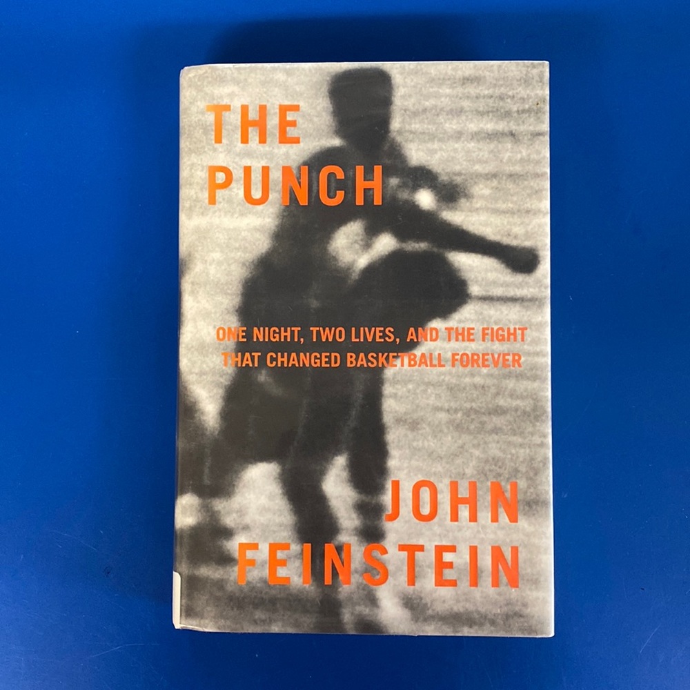 The Punch: One Night, Two Lives, and the Fight That Changed Basketball Forever